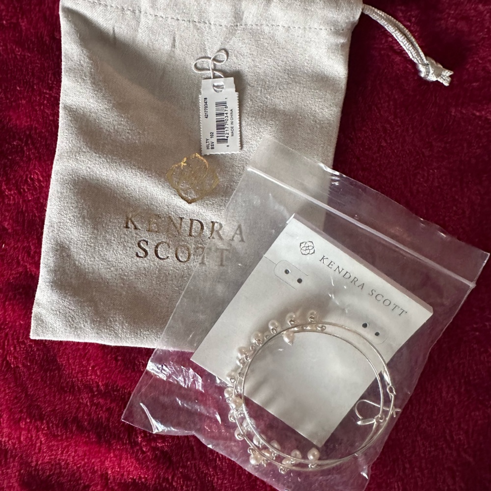 Kendra Scott large hoops with beautiful pearl accents!
